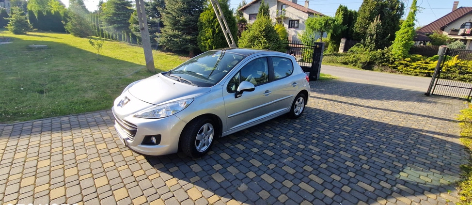 Peugeot 207 cena 16800 przebieg: 129107, rok produkcji 2010 z Bełchatów małe 407